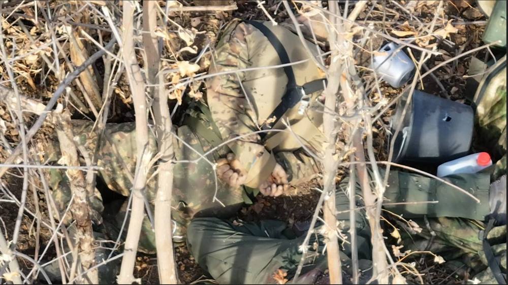 Окупанти зв’язали і вбили українських військовополонених. Фото2