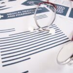 Які хвороби покриває страхування для подорожі в Україну? 24 medical records report stethoscope medical concept 1150 2274