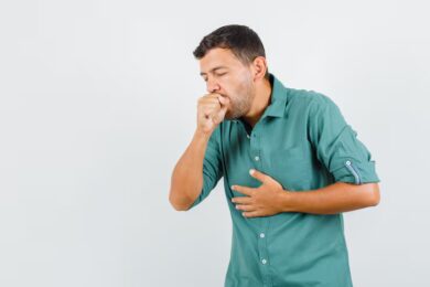 young man suffering from cough
